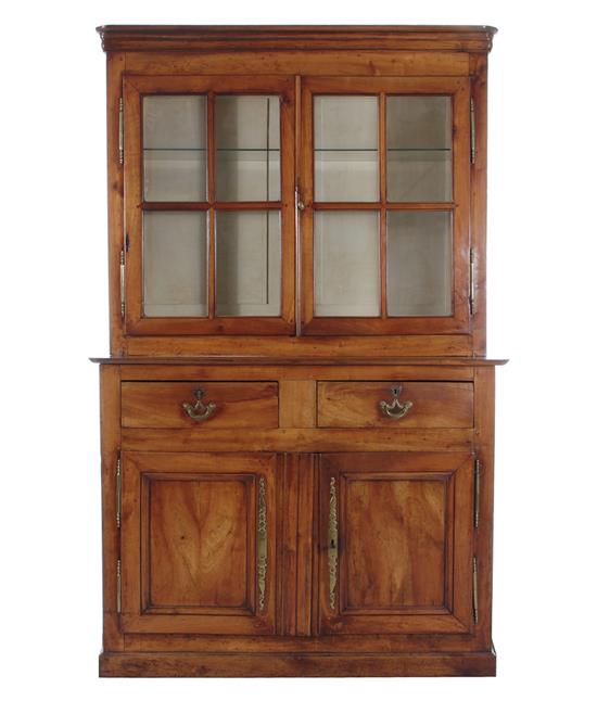 Appraisal: French cherry stepback cabinet late th century molded cornice glazed