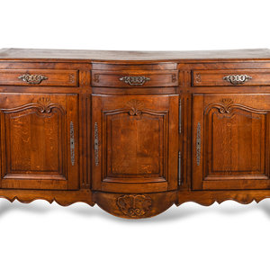 Appraisal: A Louis XV Provincial Style Carved Oak Buffet TH CENTURY