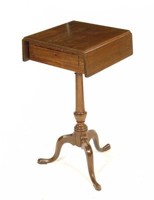 Appraisal: A mahogany occasional table the drop-leaf top above a drawer