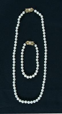 Appraisal: Mikimoto pearl necklace bracelet each a knotted single strand of