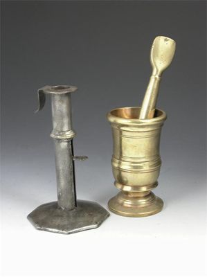 Appraisal: A pewter candlestick with octagonal base and push up lever