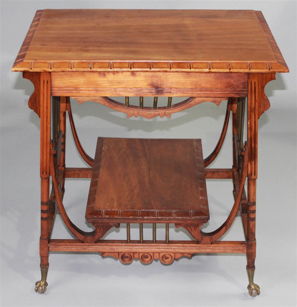 Appraisal: EASTLAKE STYLE CARVED WALNUT TABLE having a rectangular top with