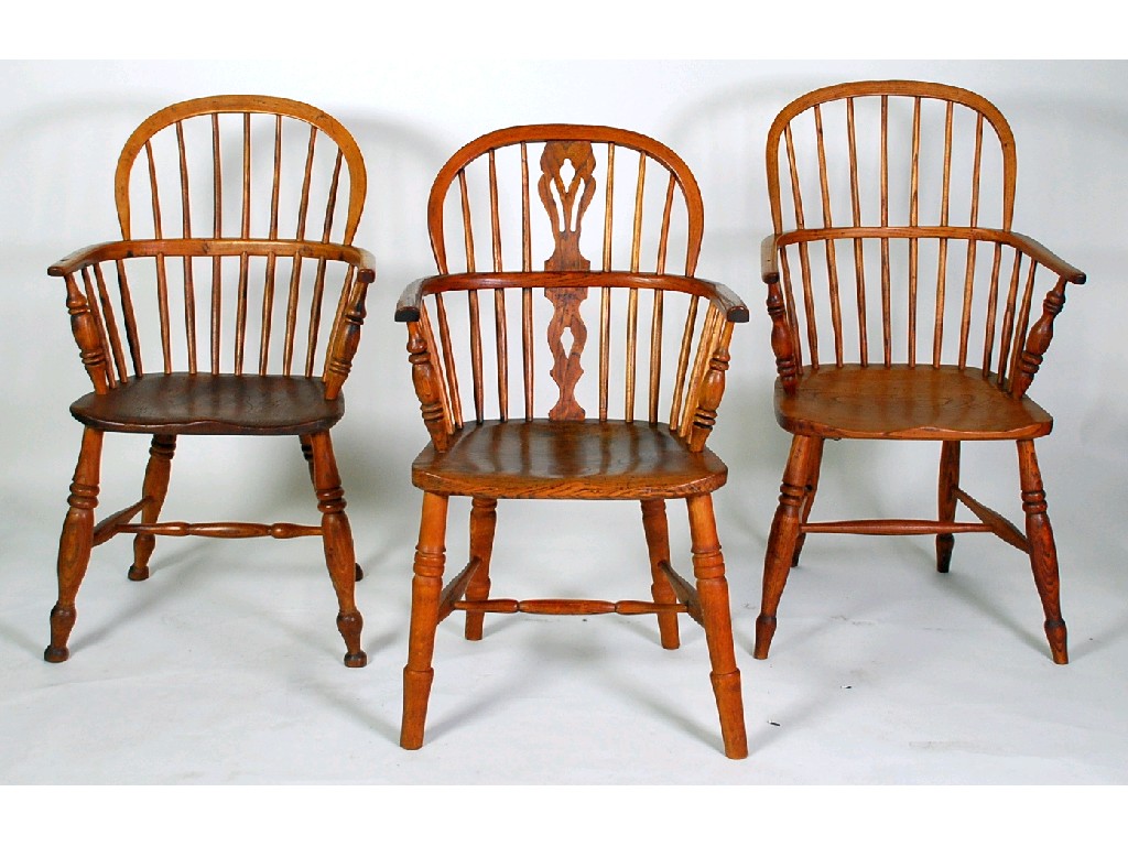 Appraisal: MATCHED SET OF FOUR ELM STICK BACK LOW WINDSOR ARMCHAIRS