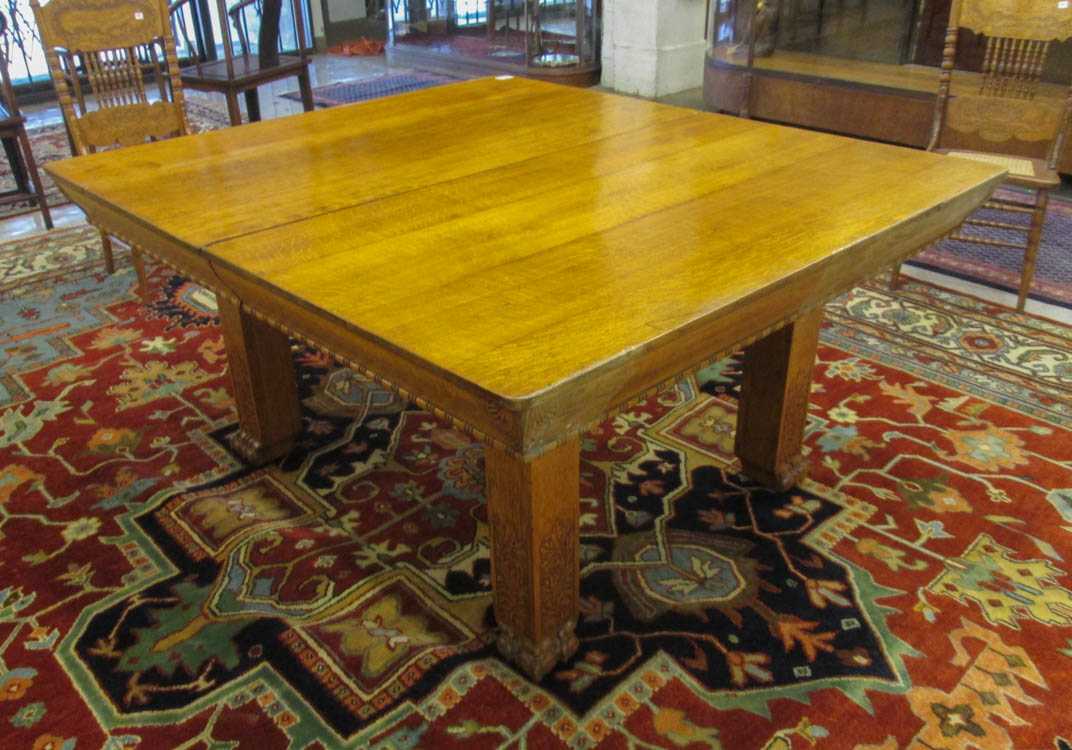 Appraisal: RECTANGULAR OAK DINING TABLE WITH LEAF American c on five