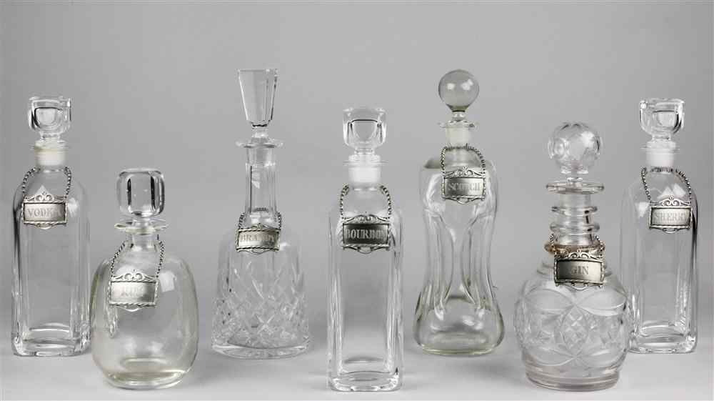 Appraisal: SEVEN GLASS DECANTERS AND STOPPERS AND SEVEN LABELS including one