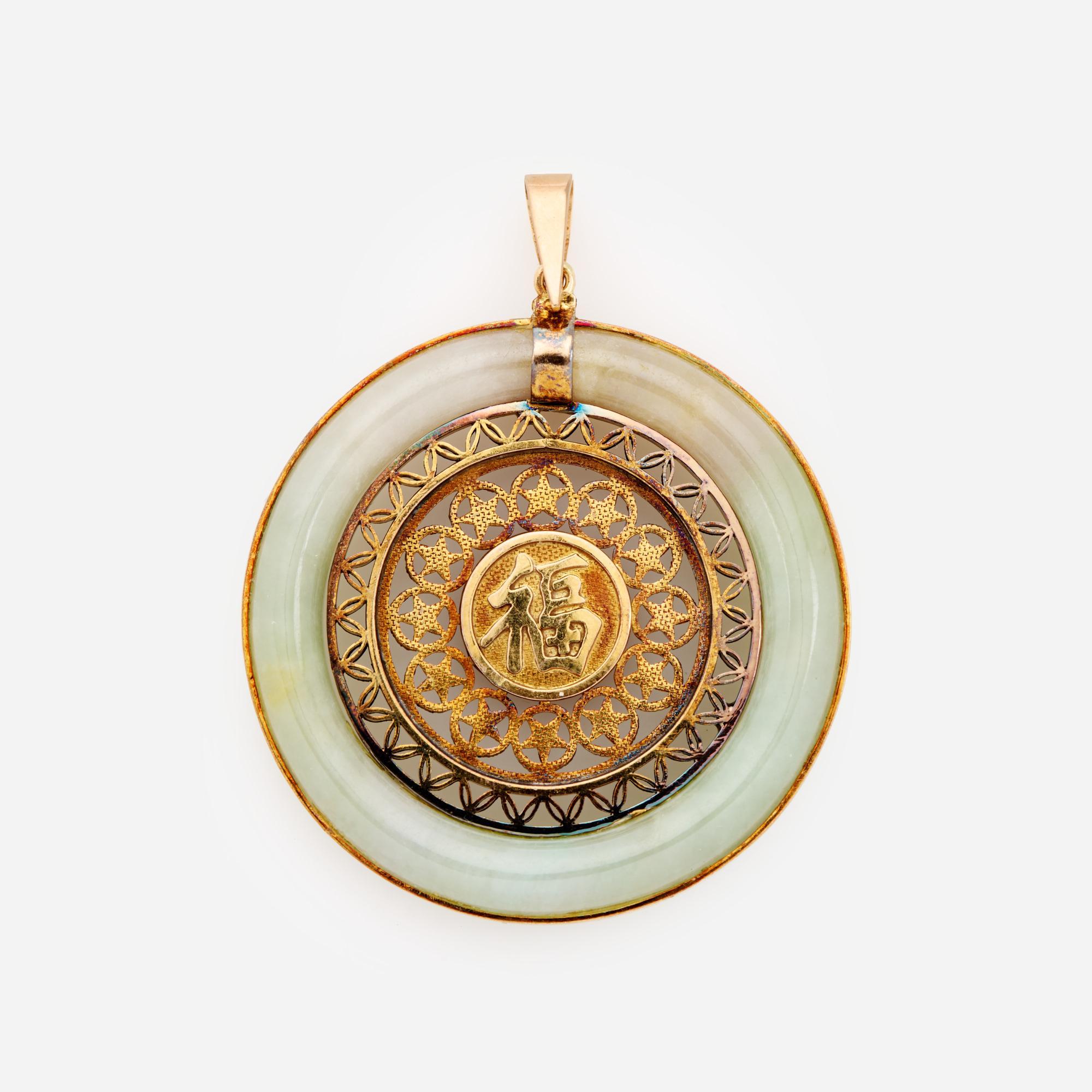 Appraisal: JADEITE JADE MEDALLION PENDANT IN K A k yellow gold