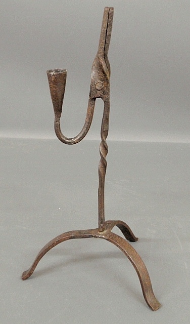 Appraisal: - Wrought iron lighting device with arched legs probably th