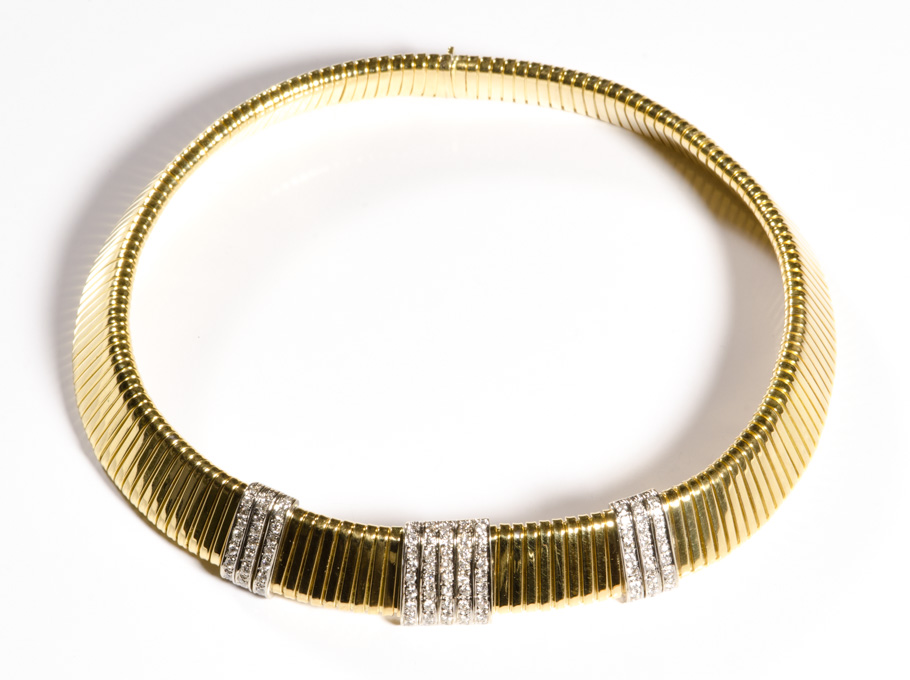 Appraisal: CARLO WEINGRILL EIGHTEEN KARAT GOLD AND DIAMOND 'TUBOGAS' NECKLACE Carlo