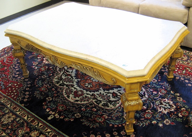 Appraisal: LOUIS XIV STYLE COFFEE TABLE having a rectangular bianco travertine