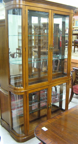 Appraisal: COLLECTOR'S MAHOGANY CURIO DISPLAY CABINET-ON-CABINET Pulaski Furniture Co model -