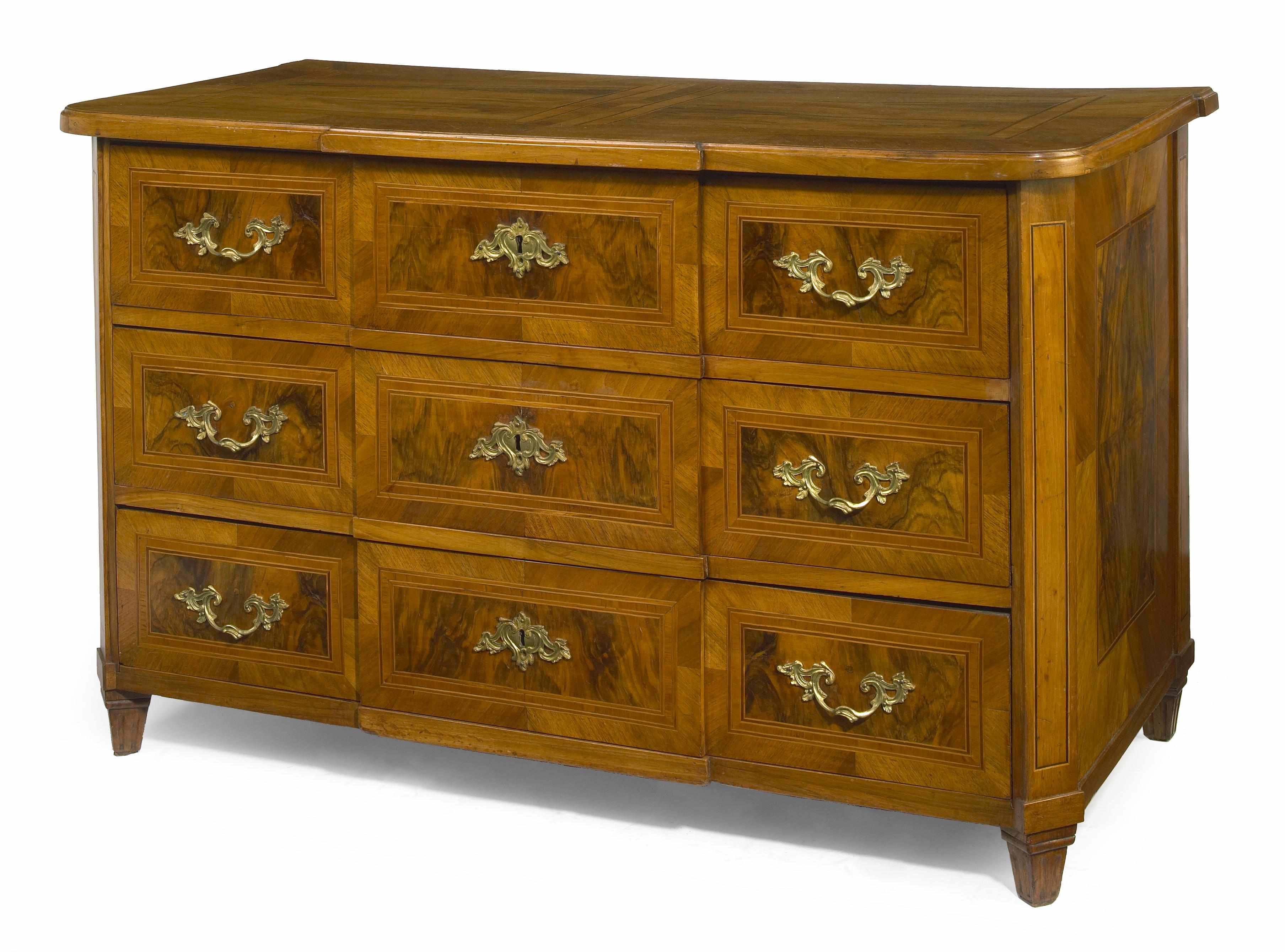 Appraisal: A Continental Neoclassical inlaid fruitwood and figured walnut chest of