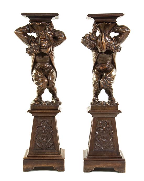 Appraisal: Sale Lot A Pair of Continental Carved Figural Pedestals each