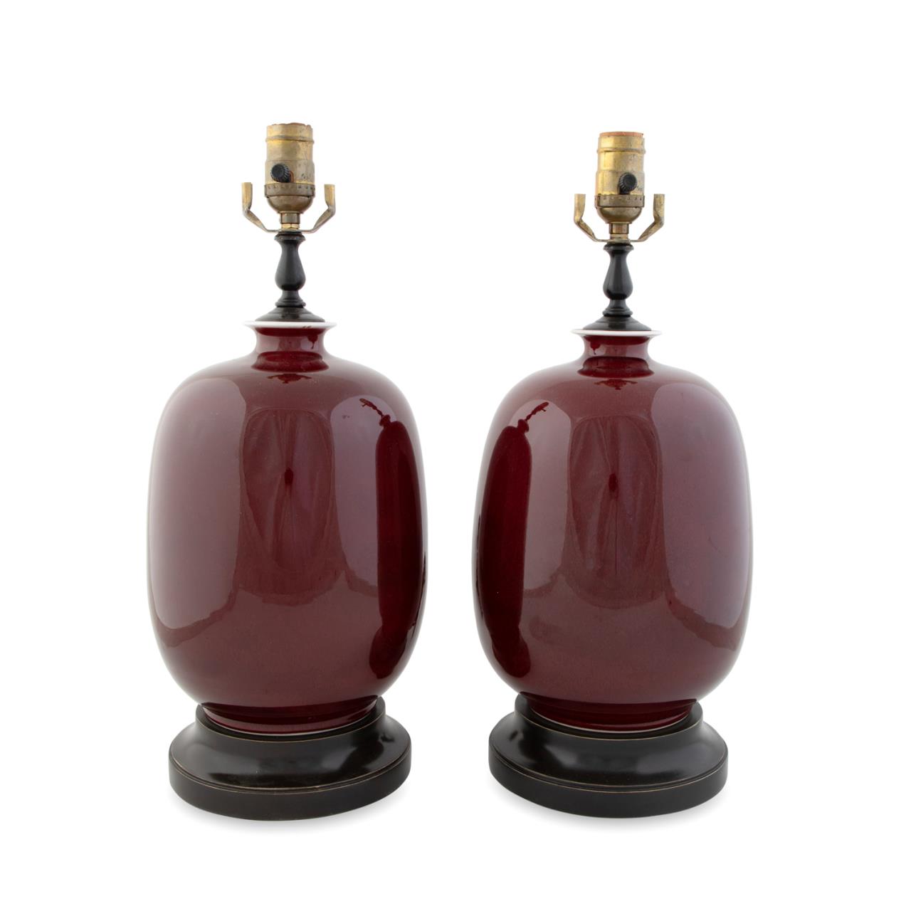 Appraisal: PAIR OF SANG DE BEOUF PORCELAIN TABLE LAMPS Pair of