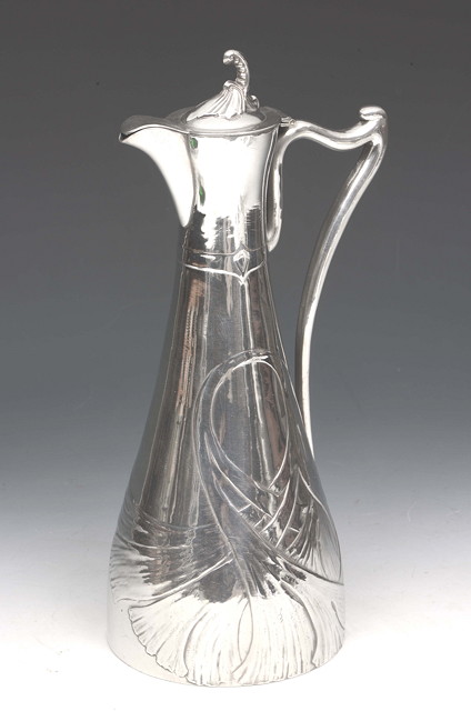 Appraisal: An Edvard Hueck Secessionist water wine jug with raised flowing