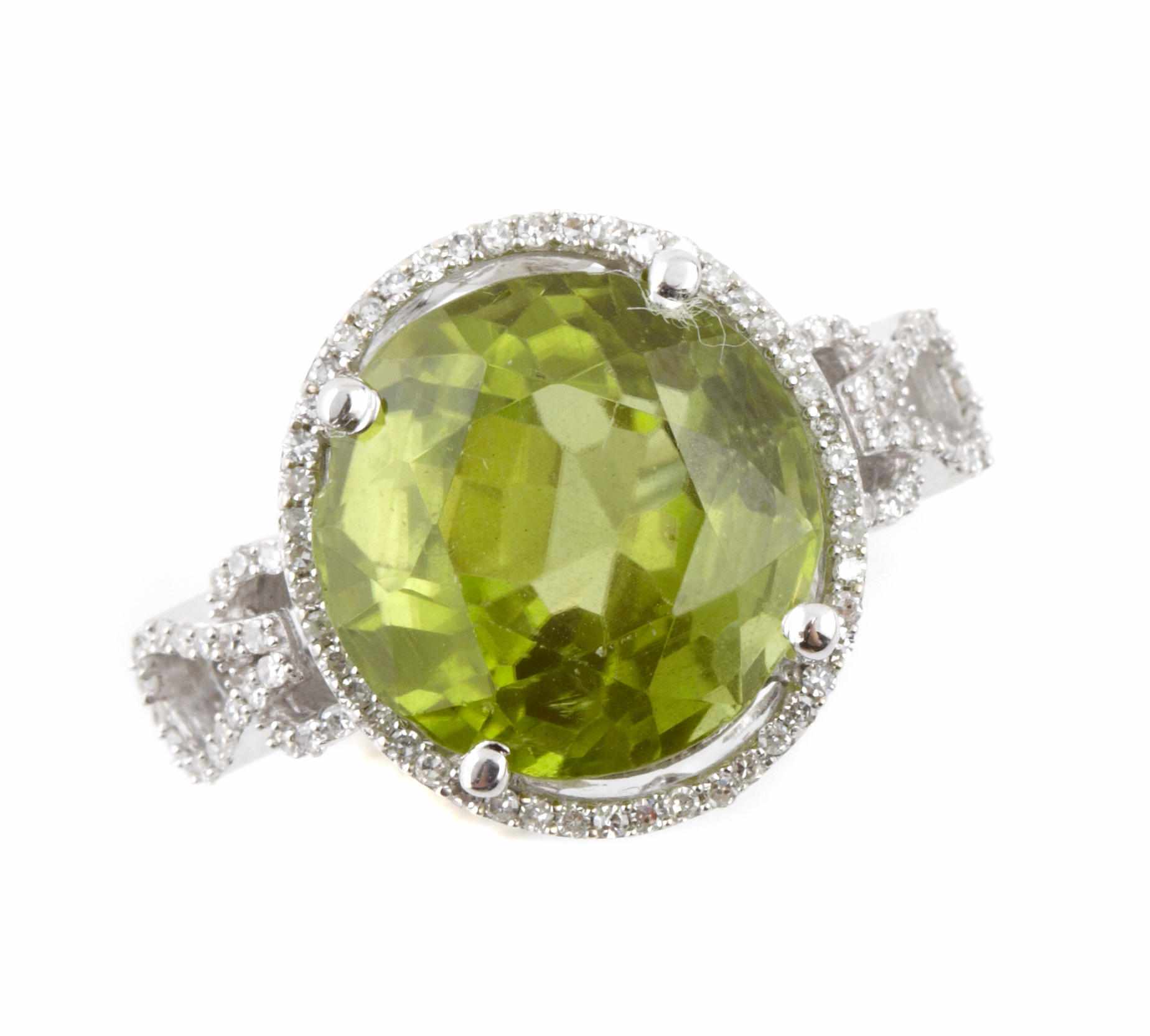 Appraisal: A peridot diamond and k white gold ring size