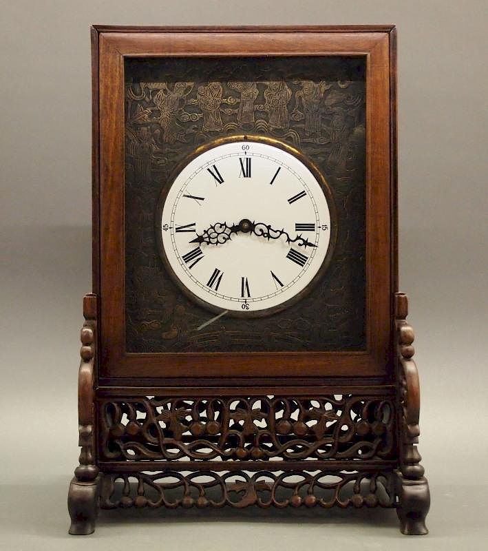 Appraisal: Chinese bracket clock An early th century Chinese rosewood bracket