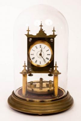 Appraisal: A brass torsion clock the '' white enamel dial marked