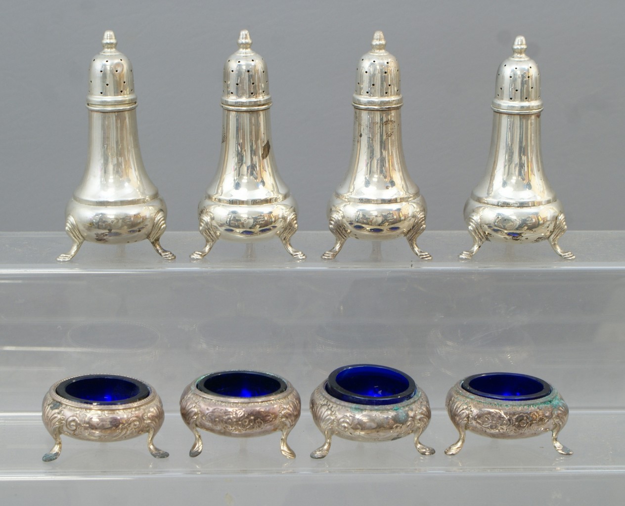 Appraisal: English sterling silver open salts with cobalt inserts London salt