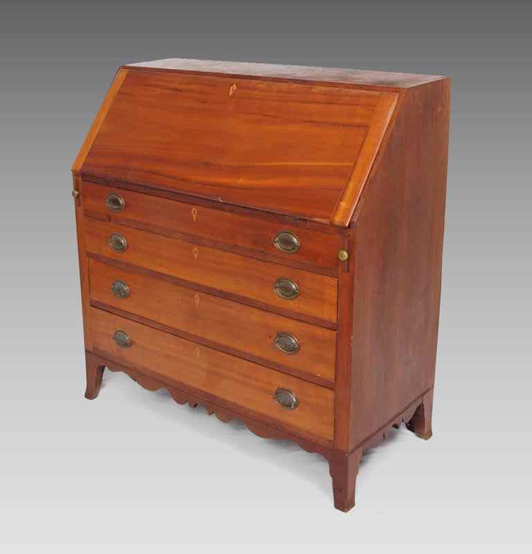 Appraisal: HEPPLEWHITE CHERRY SLANT FRONT DESK Slant front with fitted interior