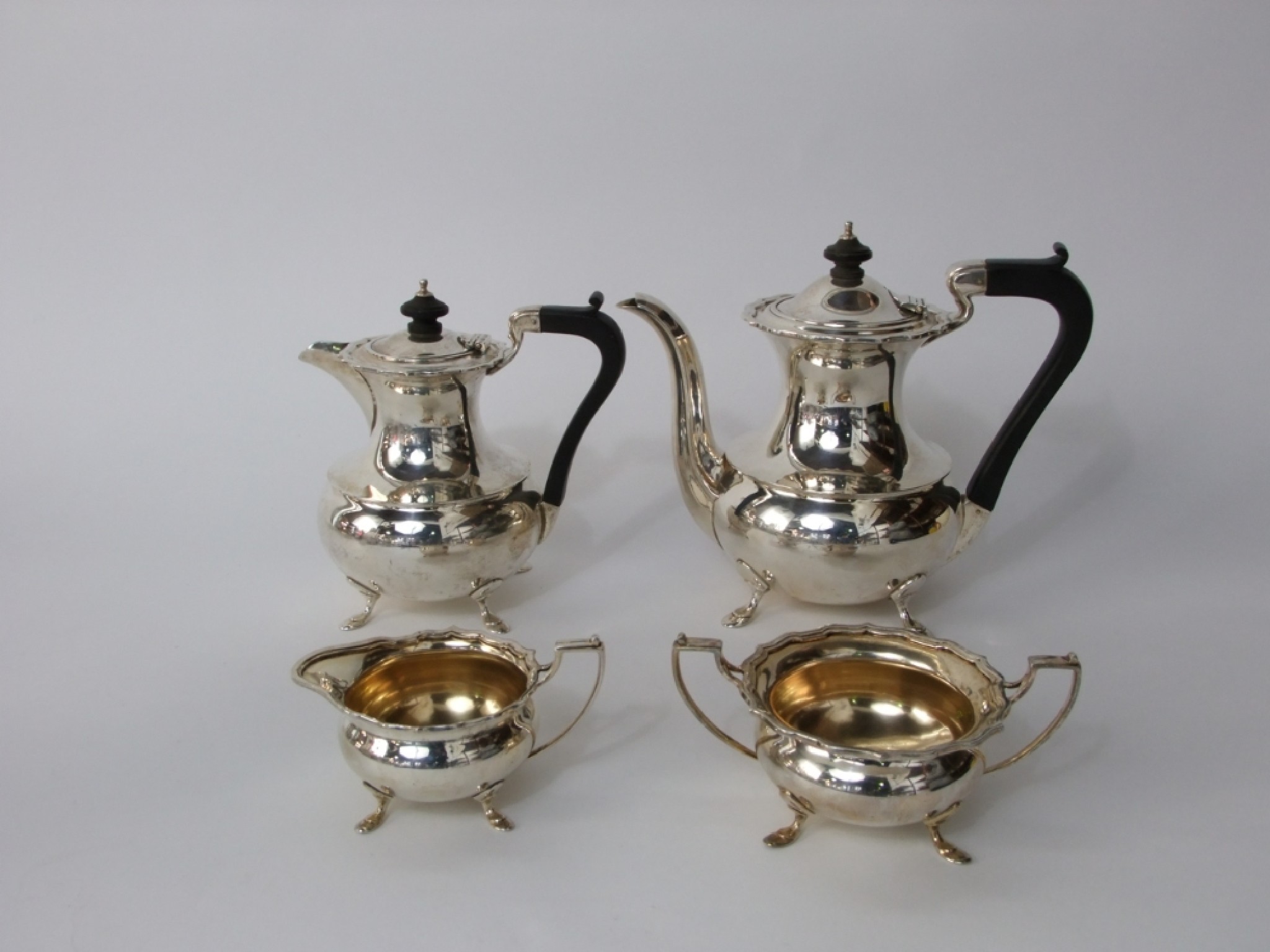 Appraisal: A silver four piece tea and coffee set teapot sugar