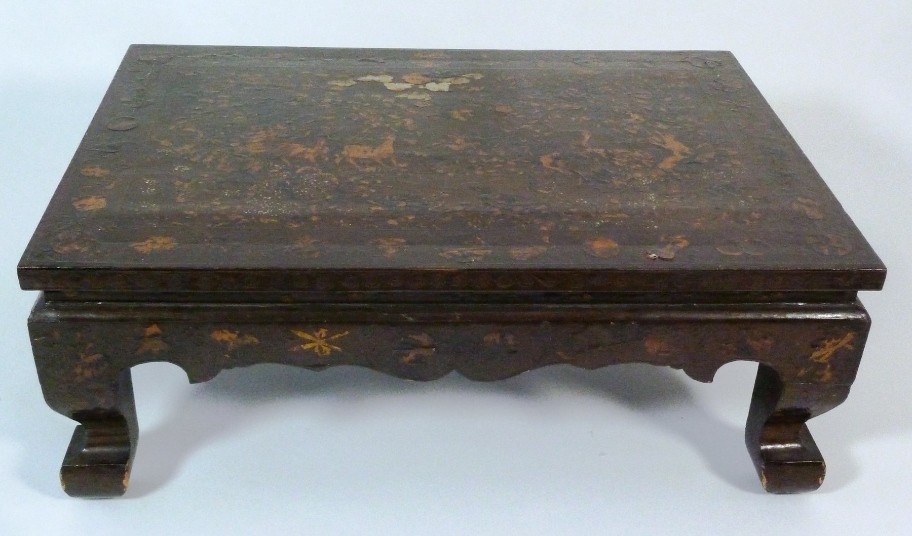 Appraisal: An Oriental lacquer and faux tortoiseshell low table cm wideProvenance