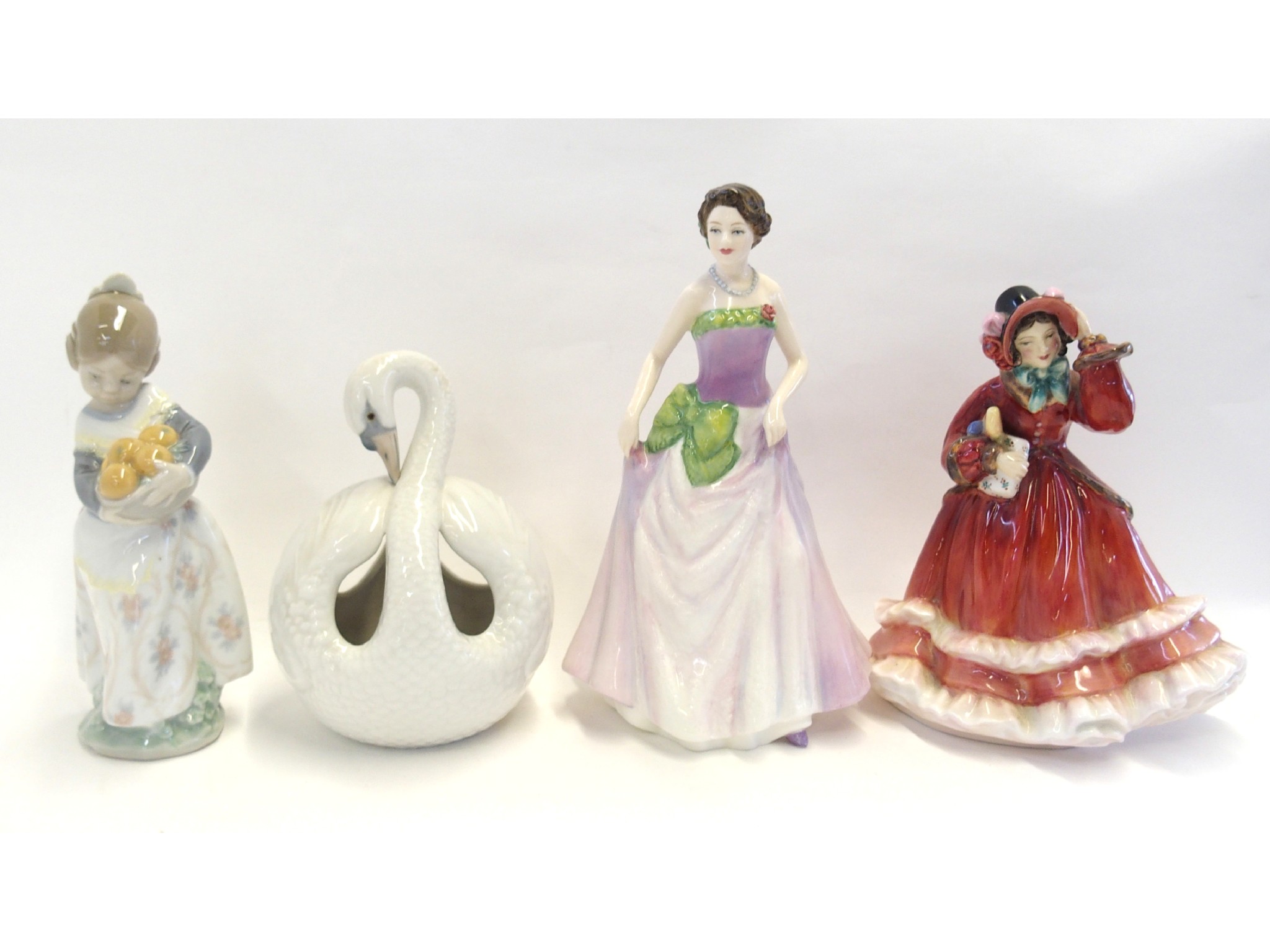 Appraisal: Two Royal Doulton figures 'Christmas Time' def 'Jessica' together with