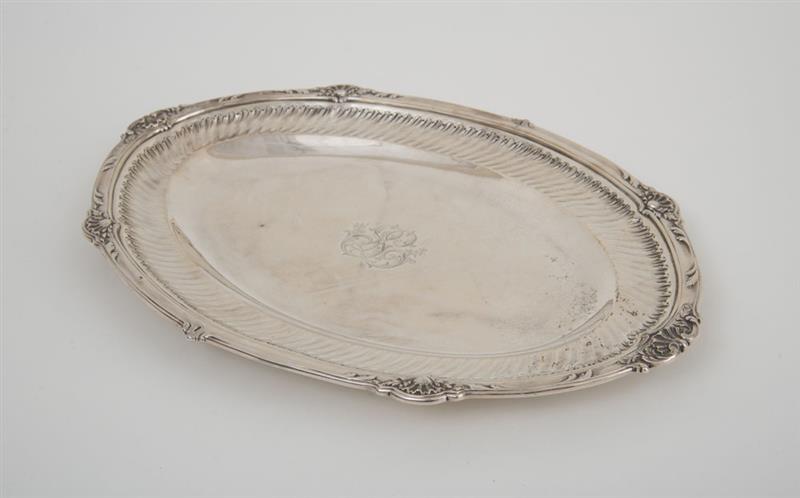 Appraisal: FRENCH MONOGRAMMED SILVER MEAT DISH Marked 'Puiforcat' with diagonal shell-tipped