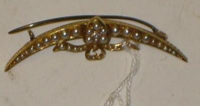 Appraisal: A LATE VICTORIAN SEED PEARL BROOCH of crescent bow and