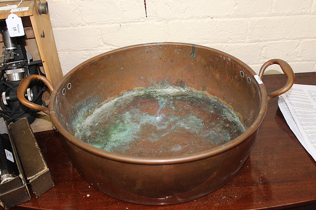 Appraisal: A VICTORIAN TWO HANDLED COPPER JAM PAN cm diameter