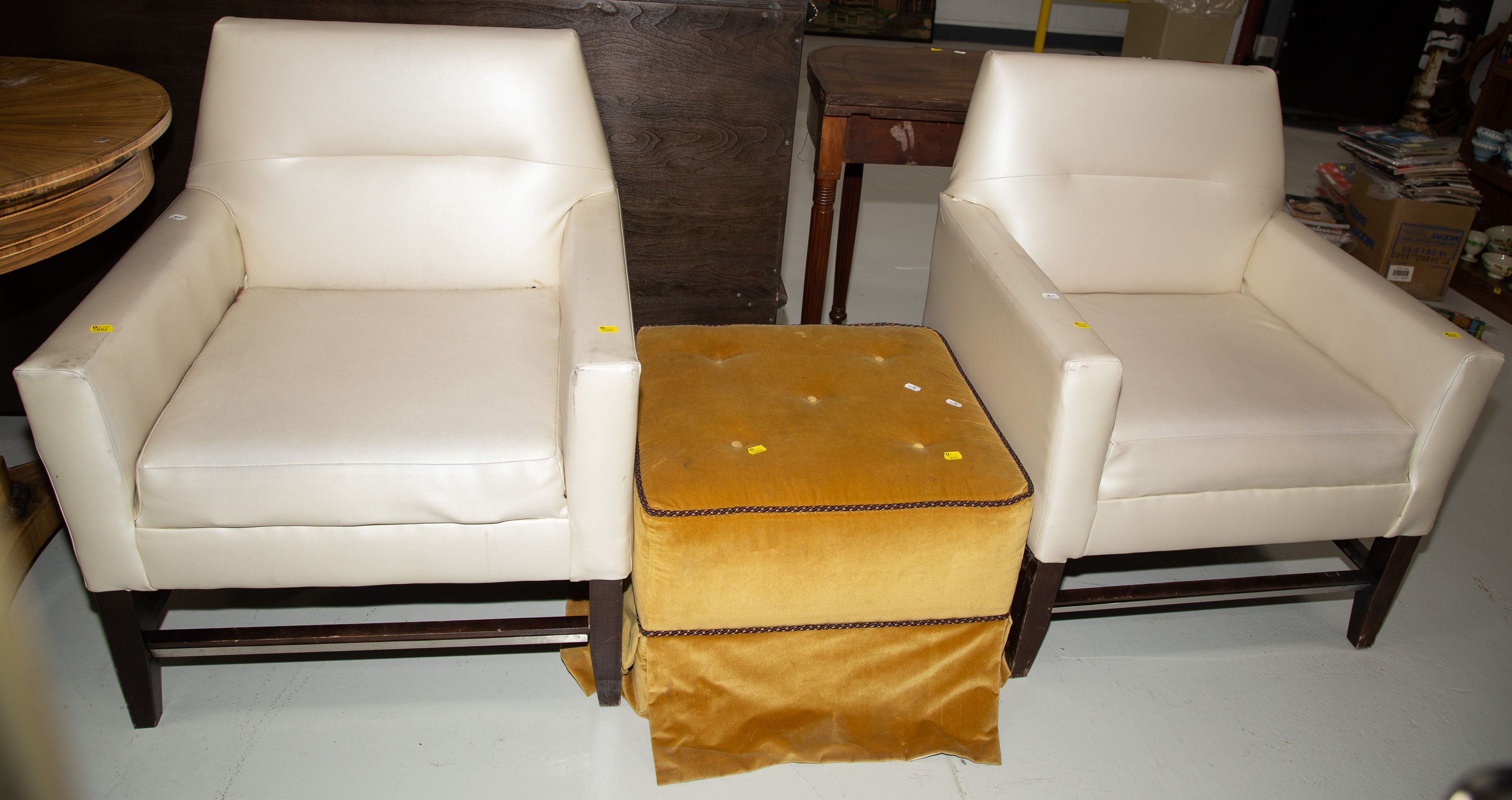 Appraisal: A PAIR OF ART DECO CLUB CHAIRS AN OTTOMAN Chairs