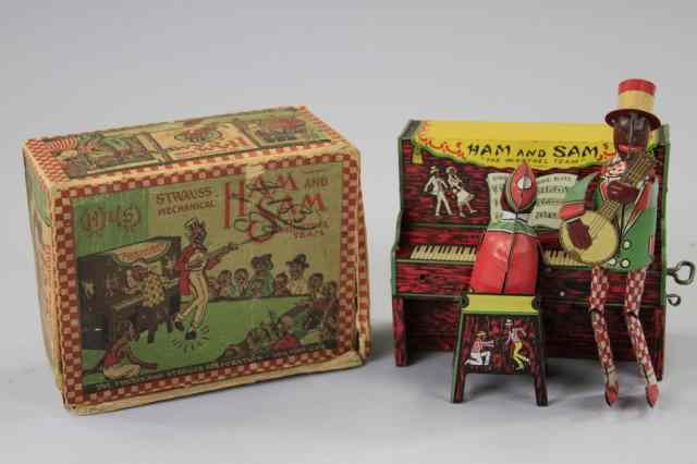 Appraisal: BOXED HAM AND SAM MINSTREL TEAM Strauss lithographed tin colorful