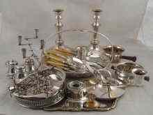 Appraisal: A quantity of silver plate comprising candlestick swing handled basket