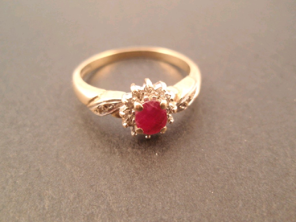 Appraisal: A ruby and tiny diamond cluster ct gold dress ring