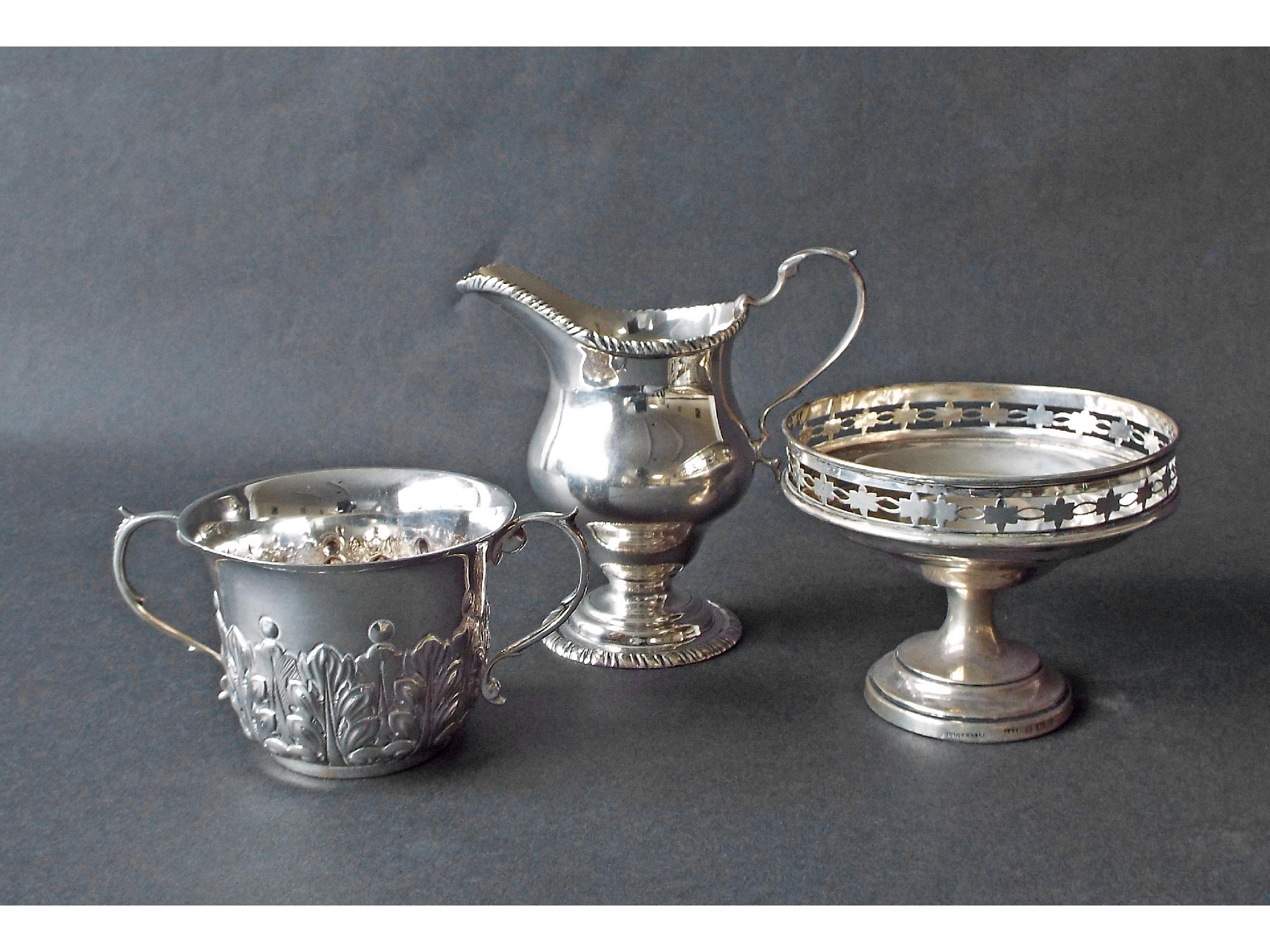 Appraisal: Late Victorian twin handled silver porringer with half banded acanthus