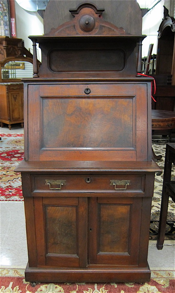 Appraisal: A VICTORIAN WALNUT SLANT-FRONT DESK ON CABINET American c -