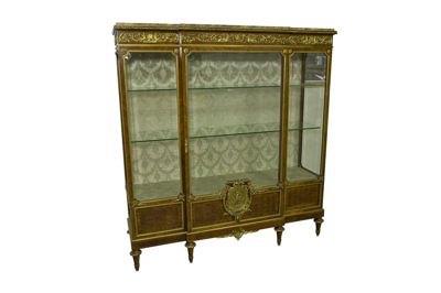 Appraisal: A gilt metal mounted breakfront kingwood display cabinet of Louis