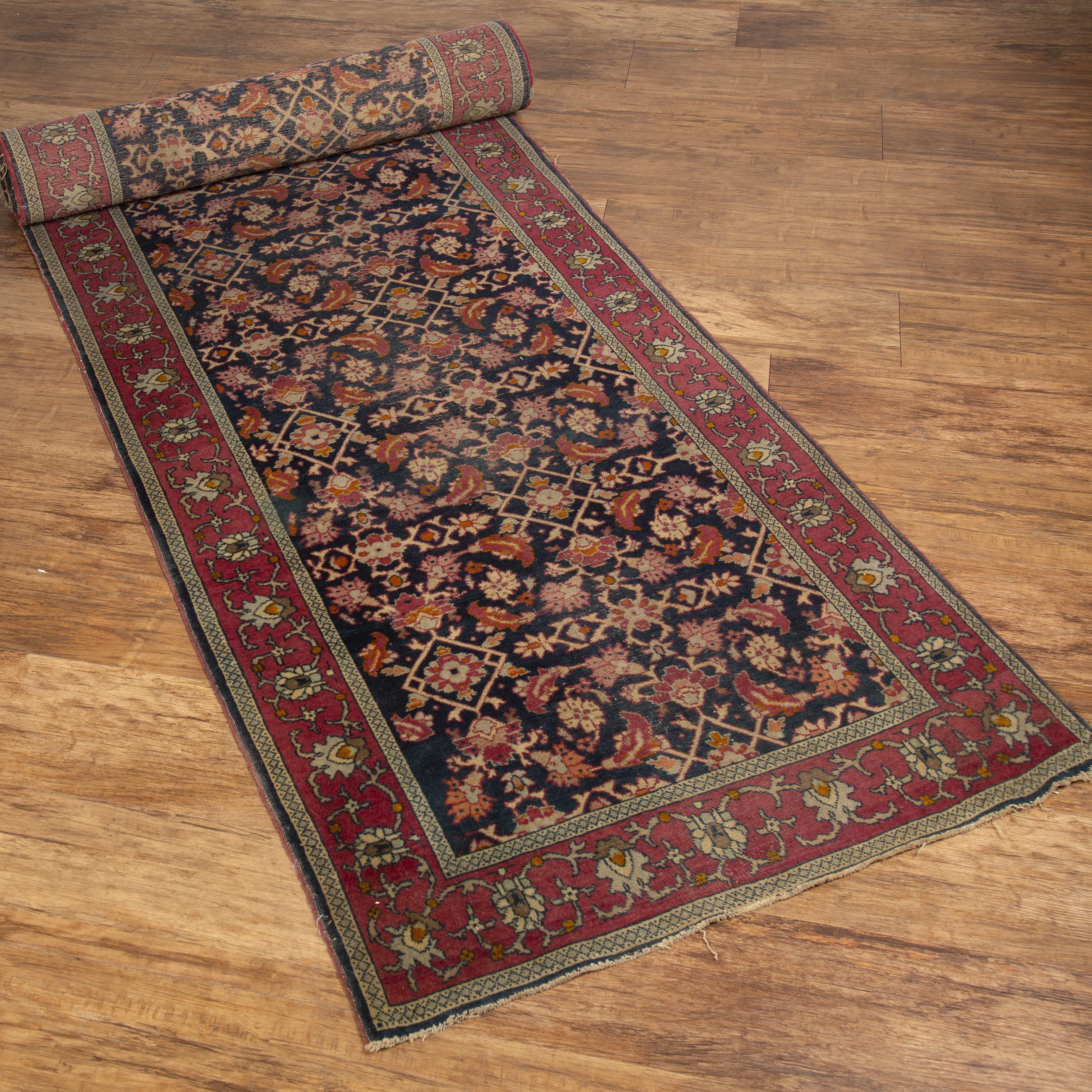 Appraisal: Hamadan blue ground runnerwith all-over foliate decoration and red ground