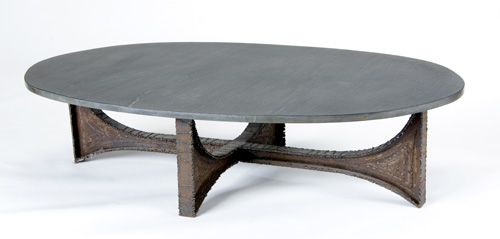 Appraisal: PAUL EVANS Sculpted Steel coffee table with oval slate top