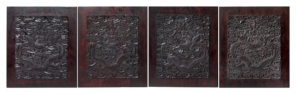 Appraisal: A Set of Four Chinese Zitan Wood 'Dragon' Panels Each