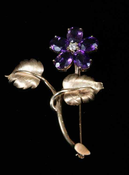 Appraisal: SIGNED CARTIER YELLOW GOLD AMETHYST AND DIAMOND FLOWER DESIGN BROOCH