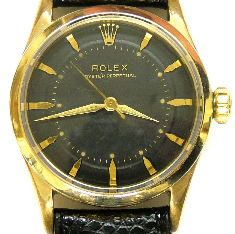 Appraisal: Rolex Oyster Perpetual gold capped 's gentleman's wristwatch the black