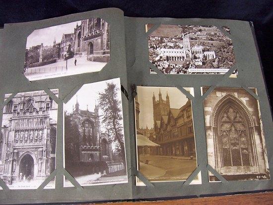 Appraisal: An early th Century postcard album Gloucester Cathedral streets etc