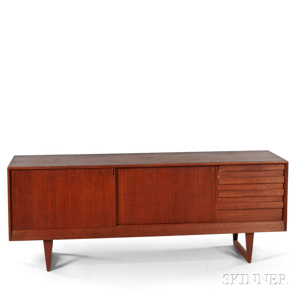 Appraisal: Kurt Ostervig Credenza Teak teak veneers Denmark c Rectangular top