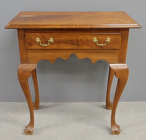 Appraisal: - Queen Anne style walnut table with a single drawer