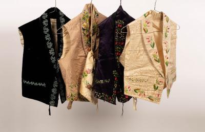 Appraisal: Three th Century silk embroidered waistcoats a velvet embroidered waistcoat