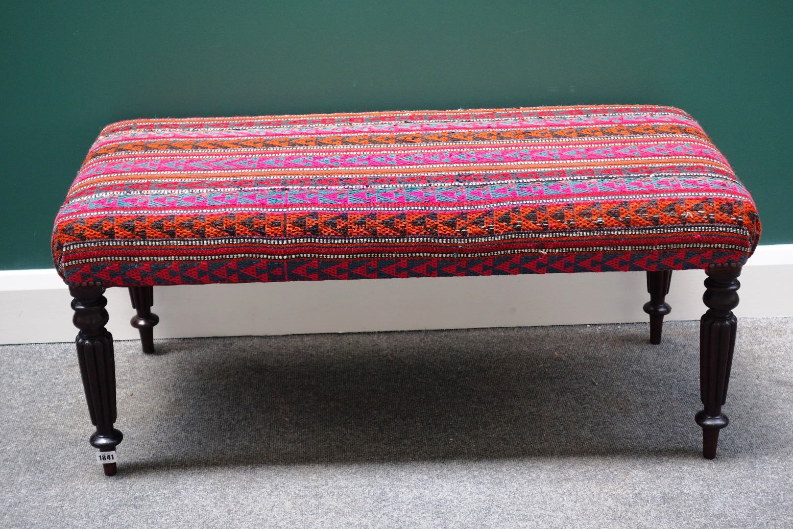 Appraisal: A rectangular footstool the kelim upholstered top on four William