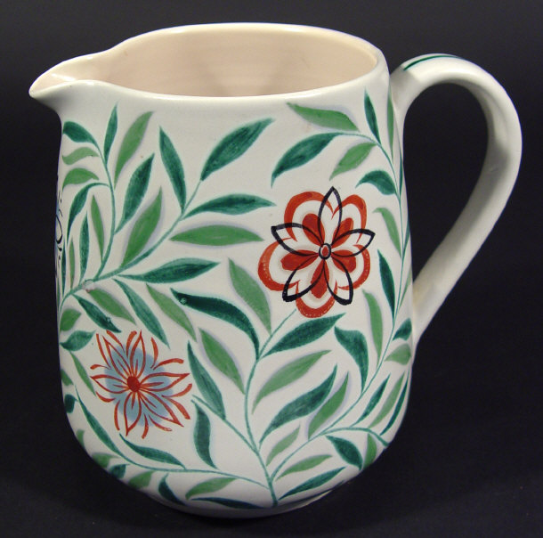 Appraisal: Poole Pottery jug hand painted with traditional flowers and leaves