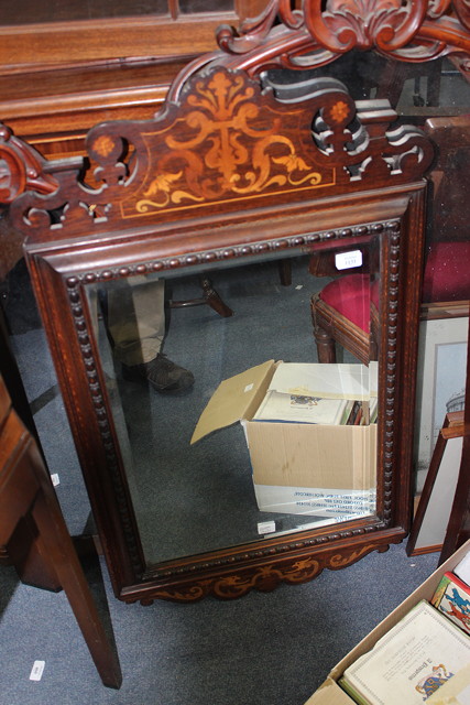 Appraisal: AN EDWARDIAN ROSEWOOD AND MARQUETRY INLAID HANGING WALL MIRROR with