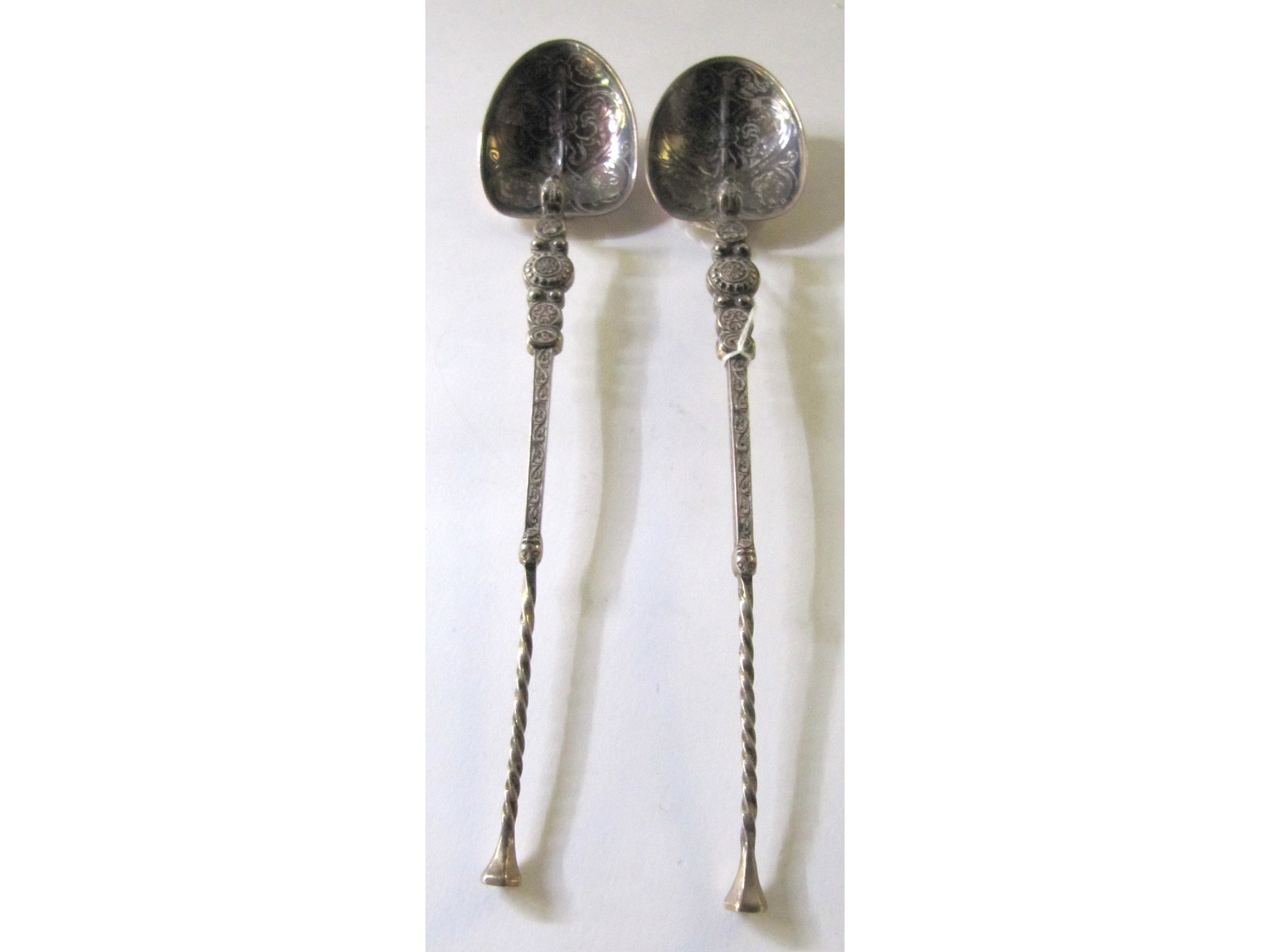 Appraisal: A pair of silver anointing spoons Birmingham