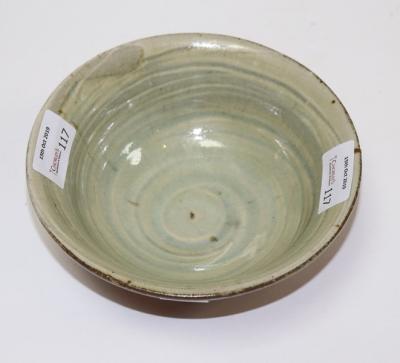 Appraisal: Mike Dodd British born a circular stoneware bowl with rust